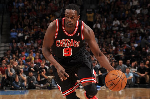 DENVER, CO - NOVEMBER 21: Luol Deng #9 of the Chicago Bulls drives to the basket against the Denver Nuggets on November 21, 2013 at the Pepsi Center in Denver, Colorado. NOTE TO USER: User expressly acknowledges and agrees that, by downloading and/or using this Photograph, user is consenting to the terms and conditions of the Getty Images License Agreement. Mandatory Copyright Notice: Copyright 2013 NBAE (Photo by Bart Young/NBAE via Getty Images)