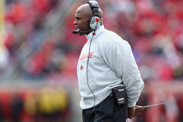 LOUISVILLE, KY - NOVEMBER 23:  Charlie Strong the head coach of the Louisville Cardinals watches the action during the game against the Memphis Tigers at Papa John's Cardinal Stadium on November 23, 2013 in Louisville, Kentucky.  (Photo by Andy Lyons/Getty Images)