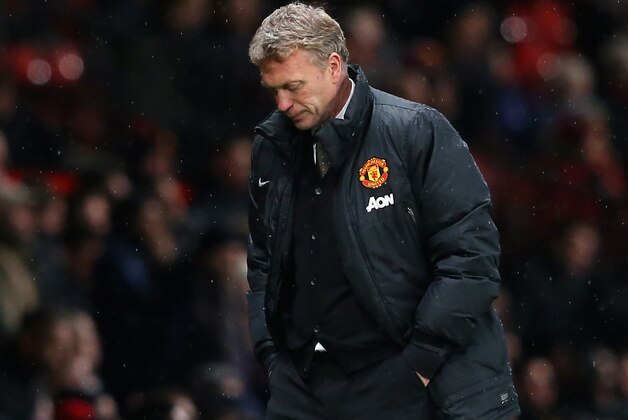 MANCHESTER, ENGLAND - JANUARY 05:  Manchester United Manager David Moyes reacts during the FA Cup with Budweiser Third round match between Manchester United and Swansea City at Old Trafford on January 5, 2014 in Manchester, England.  (Photo by Alex Livesey/Getty Images)