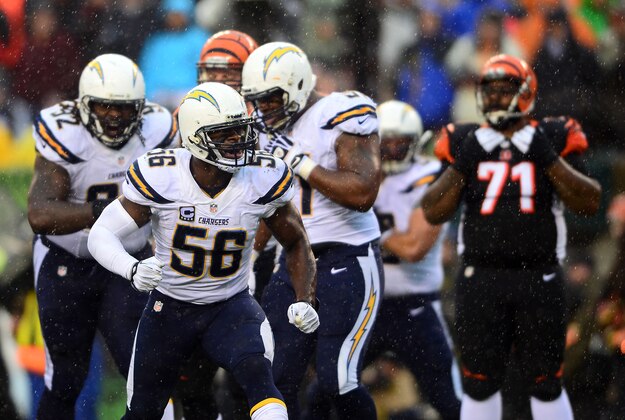 Jan 5, 2014; Cincinnati, OH, USA; San Diego Chargers inside linebacker Donald Butler (56) celebrates after a sack during fourth quarter of the AFC wild card playoff football game against the Cincinnati Bengals at Paul Brown Stadium. Mandatory Credit: Andrew Weber-USA TODAY Sports