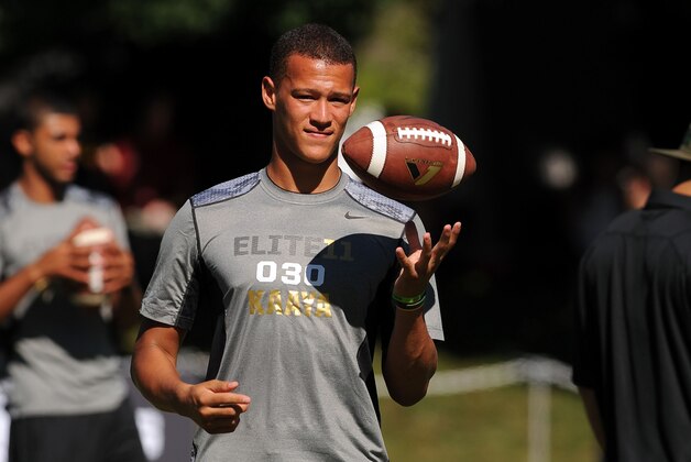 June 30, 2013; Beaverton, OR, USA; Brad Kaaya, of West Hills, California, tosses the ball during the morning session of the Elite 11 at Nike World Headquarters. Mandatory Credit: Steve Dykes-USA TODAY Sports