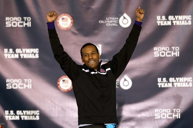 SALT LAKE CITY, UT - DECEMBER 31:  Shani Davis celebrates on the medals podium after winning the men's 1,500 meter during the U.S. Speed Skating Long Track Olympic Trials at the Utah Olympic Oval on December 31, 2013 in Salt Lake City, Utah.  (Photo by Matthew Stockman/Getty Images)