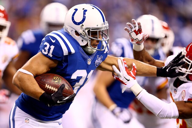 INDIANAPOLIS, IN - JANUARY 04:  Running back Donald Brown #31 of the Indianapolis Colts carries the ball against the Kansas City Chiefs during a Wild Card Playoff game at Lucas Oil Stadium on January 4, 2014 in Indianapolis, Indiana.  (Photo by Andy Lyons/Getty Images)