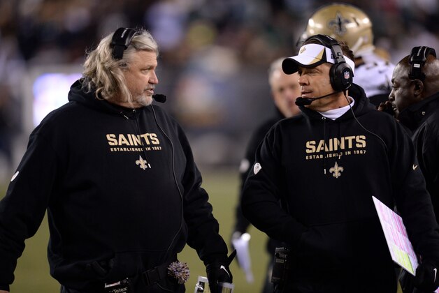 Jan 4, 2014; Philadelphia, PA, USA; New Orleans Saints defensive coordinator Rob Ryan (left) and head coach Sean Payton look on against the Philadelphia Eagles during the first half of the 2013 NFC wild card playoff football game at Lincoln Financial Field. The New Orleans Saints won the game 26-24. Mandatory Credit: Joe Camporeale-USA TODAY Sports