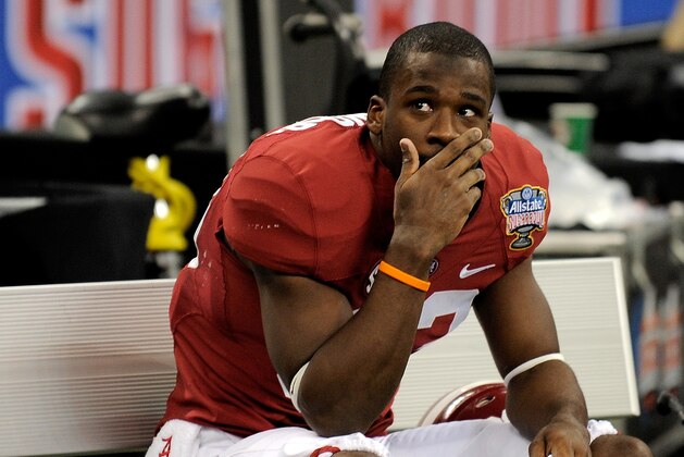NEW ORLEANS, LA - JANUARY 02:  Kevin Norwood #83 of the Alabama Crimson Tide sits on the bench after losing to the Oklahoma Sooners 45-31 in the Allstate Sugar Bowl at the Mercedes-Benz Superdome on January 2, 2014 in New Orleans, Louisiana.  (Photo by Stacy Revere/Getty Images)