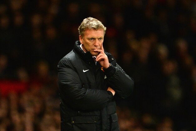 MANCHESTER, ENGLAND - JANUARY 01:  Manchester United Manager David Moyes looks on during the Barclays Premier League match between Manchester United and Tottenham Hotspur at Old Trafford on January 1, 2014 in Manchester, England.  (Photo by Michael Regan/Getty Images)