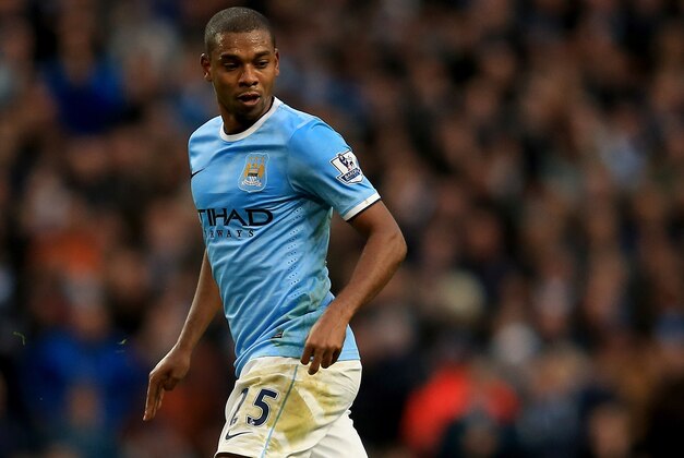 MANCHESTER, ENGLAND - DECEMBER 14:  Fernandinho of Manchester City in action during the Barclays Premier League match between Manchester City and Arsenal at Etihad Stadium on December 14, 2013 in Manchester, England.  (Photo by Richard Heathcote/Getty Images)