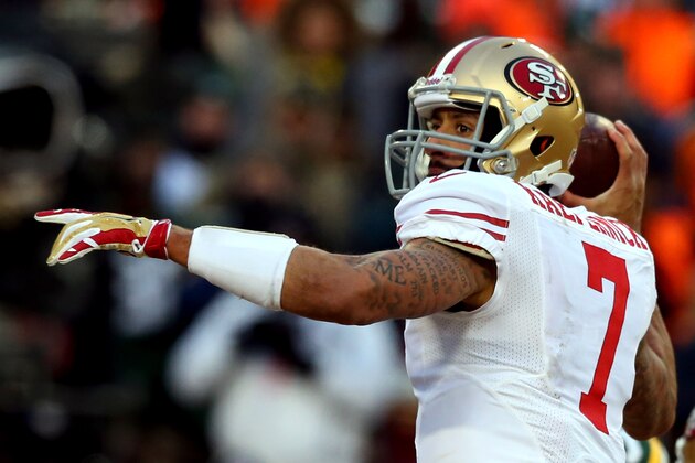 GREEN BAY, WI - JANUARY 05:  Colin Kaepernick #7 of the San Francisco 49ers looks to throw a pass in the first quarter against the Green Bay Packers during their NFC Wild Card Playoff game at Lambeau Field on January 5, 2014 in Green Bay, Wisconsin.  (Photo by Ronald Martinez/Getty Images)