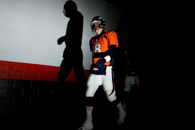DENVER, CO - DECEMBER 12:   Peyton Manning #18 of the Denver Broncos prepares for their game against the San Diego Chargers at Sports Authority Field at Mile High on December 12, 2013 in Denver, Colorado.  (Photo by Justin Edmonds/Getty Images)