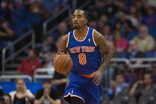 Dec 23, 2013; Orlando, FL, USA; New York Knicks shooting guard J.R. Smith (8) during the first half of the game against the Orlando Magic at the Amway Center. Mandatory Credit: Rob Foldy-USA TODAY Sports