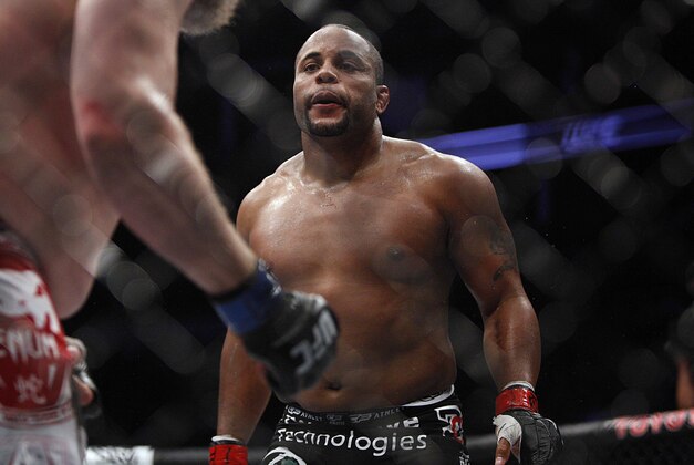 Oct 19, 2013; Houston, TX, USA; Daniel Cormier (red gloves) fights against Roy Nelson (blue gloves) in their heavyweight bout during UFC 166 at Toyota Center. Mandatory Credit: Andrew Richardson-USA TODAY Sports