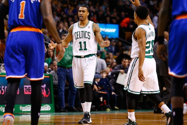 BOSTON, MA - DECEMBER 13: Courtney Lee #11 of the Boston Celtics celebrates a last-second shot to end the first quarter against the New York Knicks during the game at TD Garden on December 13, 2013 in Boston, Massachusetts. NOTE TO USER: User expressly acknowledges and agrees that, by downloading and or using this photograph, User is consenting to the terms and conditions of the Getty Images License Agreement.  (Photo by Jared Wickerham/Getty Images)