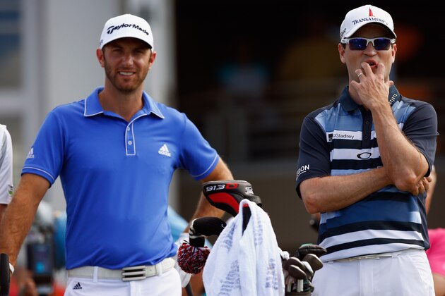 LAHAINA, HI - JANUARY 05:  (L-R) Dustin Johnson and Zach Johnson wait to hit tee shots during round three of the Hyundai Tournament of Champions at the Plantation Course at Kapalua Golf Club on January 5, 2014 in Lahaina, Hawaii.  (Photo by Tom Pennington/Getty Images)