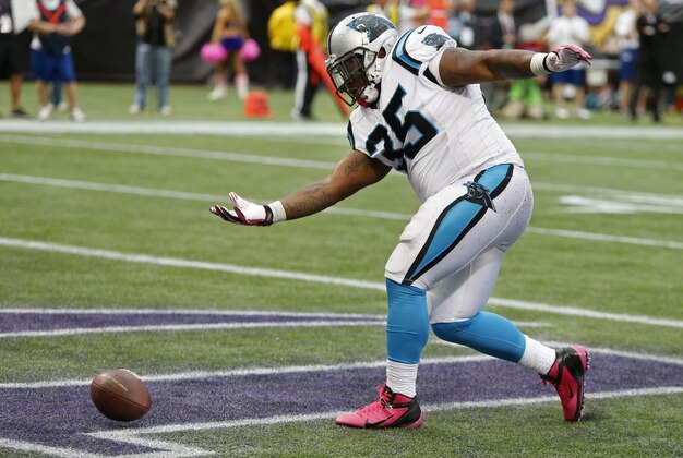 Oct 13, 2013; Minneapolis, MN, USA; Carolina Panthers fullback Mike Tolbert (35) celebrates his touchdown run against the Minnesota Vikings in the fourth quarter at Mall of America Field at H.H.H. Metrodome. Panthers win 35-10. Mandatory Credit: Bruce Kluckhohn-USA TODAY Sports