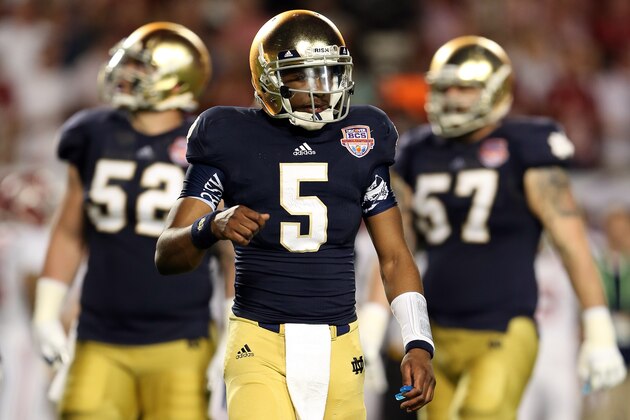 MIAMI GARDENS, FL - JANUARY 07:  Everett Golson #5 of the Notre Dame Fighting Irish looks on after failing to convert on third down against the Alabama Crimson Tide during the 2013 Discover BCS National Championship game at Sun Life Stadium on January 7, 2013 in Miami Gardens, Florida.  (Photo by Streeter Lecka/Getty Images)