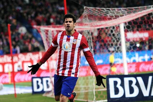 MADRID, SPAIN - DECEMBER 15:  Diego Costa of Club Atletico de Madrid celebrates after scoring Atletico's 3rd goal during the La Liga match between Club Atletico de Madrid and Valencia CF at Vicente Calderon Stadium on December 15, 2013 in Madrid, Spain.  (Photo by Denis Doyle/Getty Images)