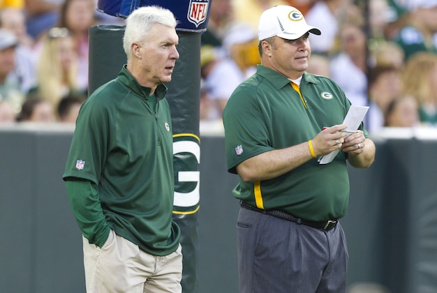 August 3, 2012; Green Bay, WI, USA; Green Bay Packers general manager Ted Thompson (left) talks with head coach Mike McCarthy prior to the family night scrimmage at Lambeau Field in Green Bay, WI. Mandatory Credit: Jeff Hanisch-USA TODAY Sports