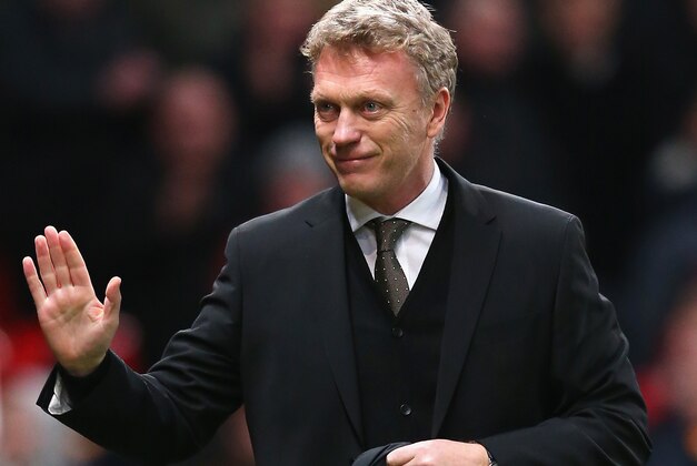 MANCHESTER, ENGLAND - JANUARY 05:  Manchester United manager David Moyes acknowledges the crowd prior to the FA Cup with Budweiser Third round match between Manchester United and Swansea City at Old Trafford on January 5, 2014 in Manchester, England.  (Photo by Alex Livesey/Getty Images)