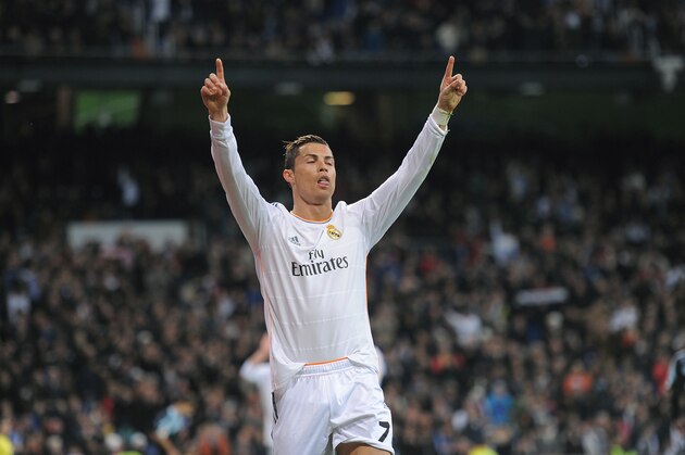 MADRID, SPAIN - JANUARY 06:  Cristiano Ronaldo of Real Madrid CF celebrates after scoring Real's 2nd goal during the La Liga match between Real Madrid CF and RC Celta de Vigo at the Santiago Bernabeu stadium on January 6, 2014 in Madrid, Spain.  (Photo by Denis Doyle/Getty Images)