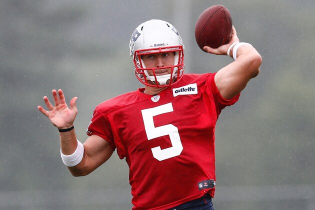 FOXBORO, MA - JULY 26: Tim Tebow #5 throws during the first day of New England Patriots Training Camp at Gillette Stadium on July 26, 2013 in Foxboro, Massachusetts. (Photo by Jim Rogash/Getty Images) FOXBORO, MA - JULY 26: Tim Tebow #5 throws during the first day of New England Patriots Training Camp at Gillette Stadium on July 26, 2013 in Foxboro, Massachusetts. (Photo by Jim Rogash/Getty Images)