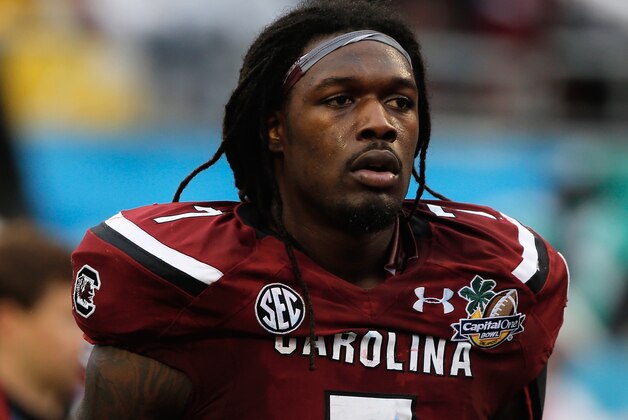 ORLANDO, FL - JANUARY 01:  Jadeveon Clowney #7 of the South Carolina Gamecocks walks off the field at the end of the first half of their game against the Wisconsin Badgers at the Capital One Bowl on January 1, 2014 in Orlando, Florida.  (Photo by Scott Halleran/Getty Images)