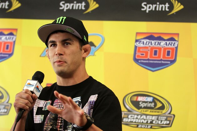 AVONDALE, AZ - NOVEMBER 11:  Ultimate Fighting Championship Bantamweight fighter Dominick Cruz speaks to the media prior to the NASCAR Sprint Cup Series AdvoCare 500 at Phoenix International Raceway on November 11, 2012 in Avondale, Arizona.  (Photo by Todd Warshaw/Getty Images for NASCAR)
