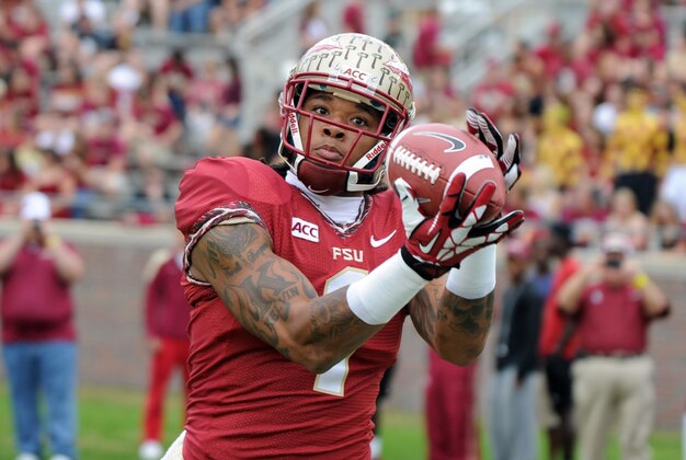 Nov 23, 2013; Tallahassee, FL, USA; Florida State Seminoles wide receiver Kelvin Benjamin (1) warms up before the game against the Idaho Vandals at Doak Campbell Stadium. Mandatory Credit: Melina Vastola-USA TODAY Sports