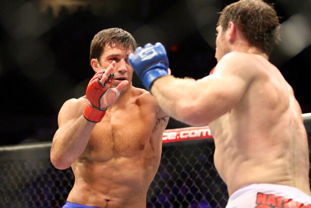 July 14, 2012; Portland, OR, USA; Luke Rockhold (left) fights Tim Kennedy (white shorts) for the middleweight title at MMA Strikeforce at the Rose Garden Arena. Mandatory Credit: Scott Olmos-USA TODAY Sports