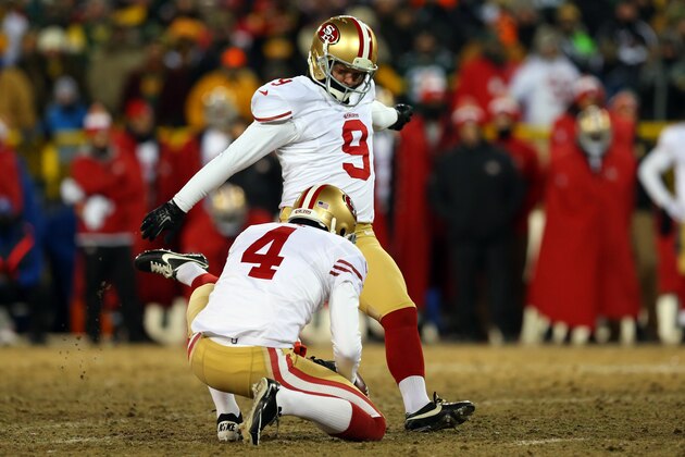 GREEN BAY, WI - JANUARY 05:  Phil Dawson #9 of the San Francisco 49ers kicks a 33 yard field goal to defeat the Green Bay Packers in their NFC Wild Card Playoff game at Lambeau Field on January 5, 2014 in Green Bay, Wisconsin. The San Francisco 49ers defeated the Green Bay Packers 23-20.  (Photo by Ronald Martinez/Getty Images)