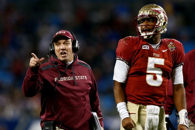 CHARLOTTE, NC - DECEMBER 07:  Head coach Jimbo Fisher and quarterback Jameis Winston #5 of the Florida State Seminoles looks on against the Duke Blue Devils during the ACC Championship game at Bank of America Stadium on December 7, 2013 in Charlotte, North Carolina.  (Photo by Streeter Lecka/Getty Images)