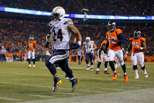 DENVER, CO - DECEMBER 12:  Running back Ryan Mathews #24 of the San Diego Chargers runs for a 23-yard touchdown during the third quarter against the Denver Broncos at Sports Authority Field Field at Mile High on December 12, 2013 in Denver, Colorado. The Chargers defeated the Broncos 27-20. (Photo by Justin Edmonds/Getty Images)
