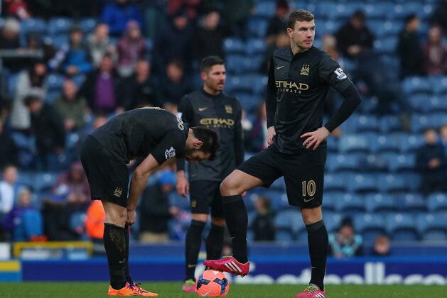 BLACKBURN, ENGLAND - JANUARY 04:  Edin Dzeko and Alvaro Negredo of Manchester City look on after conceding a goal during the Budweiser FA Cup third round match between Blackburn Rovers and Manchester City at Ewood Park on January 4, 2014 in Blackburn, England.  (Photo by Alex Livesey/Getty Images)