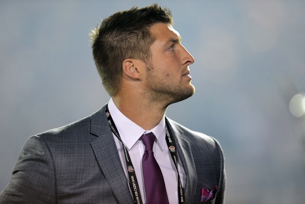 Jan 6, 2014; Pasadena, CA, USA; Florida Gators former quarterback Tim Tebow on the field before the 2014 BCS National Championship game between the Auburn Tigers and the Florida State Seminoles at the Rose Bowl.  Mandatory Credit: Jayne Kamin-Oncea-USA TODAY Sports