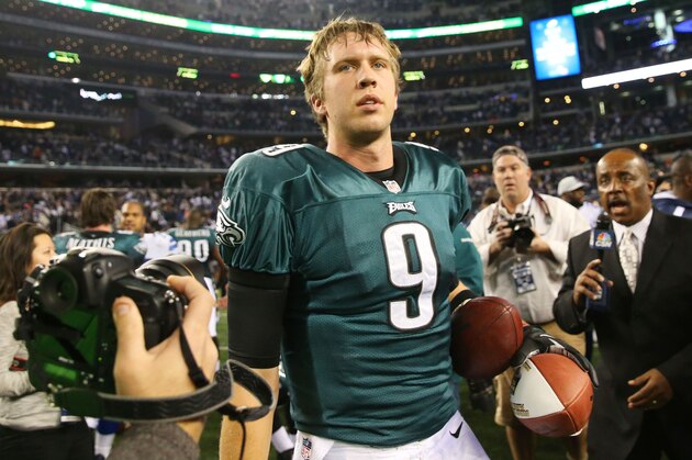 ARLINGTON, TX - DECEMBER 29:   Nick Foles #9 of the Philadelphia Eagles looks on after their 24 to 22 win over the Dallas Cowboys at Cowboys Stadium on December 29, 2013 in Arlington, Texas.  (Photo by Ronald Martinez/Getty Images)
