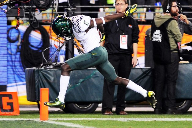 Jan. 3, 2013; Glendale, AZ, USA; Oregon Ducks running back De'Anthony Thomas (6) scores a touchdown during the kick off against the Kansas State Wildcats in the first half during the Fiesta Bowl at University of Phoenix Stadium. Mandatory Credit: Jennifer Stewart-USA TODAY Sports Jan. 3, 2013; Glendale, AZ, USA; Oregon Ducks running back De'Anthony Thomas (6) scores a touchdown during the kick off against the Kansas State Wildcats in the first half during the Fiesta Bowl at University of Phoenix Stadium. Mandatory Credit: Jennifer Stewart-USA TODAY Sports