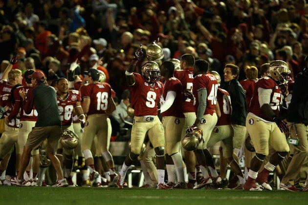 PASADENA, CA - JANUARY 06:  Running back Karlos Williams #9 of the Florida State Seminoles reacts to a play against the Auburn Tigers during the 2014 Vizio BCS National Championship Game at the Rose Bowl on January 6, 2014 in Pasadena, California.  (Photo by Jeff Gross/Getty Images)