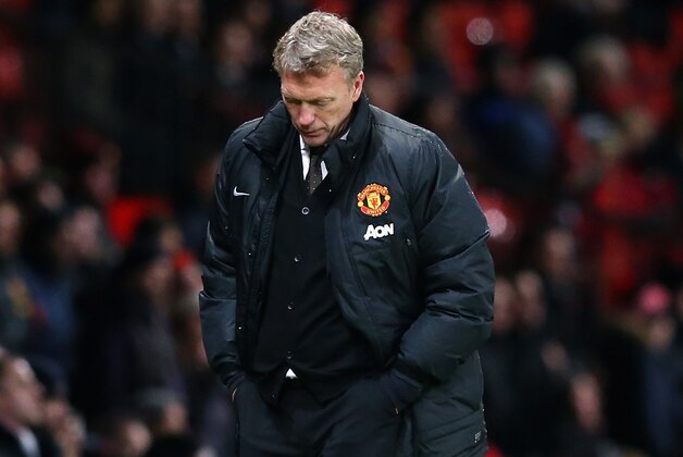 MANCHESTER, ENGLAND - JANUARY 05:  Manchester United manager David Moyes reacts during the FA Cup with Budweiser Third round match between Manchester United and Swansea City at Old Trafford on January 5, 2014 in Manchester, England.  (Photo by Alex Livesey/Getty Images)
