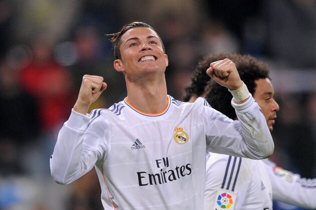 MADRID, SPAIN - JANUARY 06:  Cristiano Ronaldo of Real Madrid CF celebrates after scoring their third goal during the La Liga match between Real Madrid CF and RC Celta de Vigo at the Santiago Bernabeu stadium on January 6, 2014 in Madrid, Spain.  (Photo by Denis Doyle/Getty Images)
