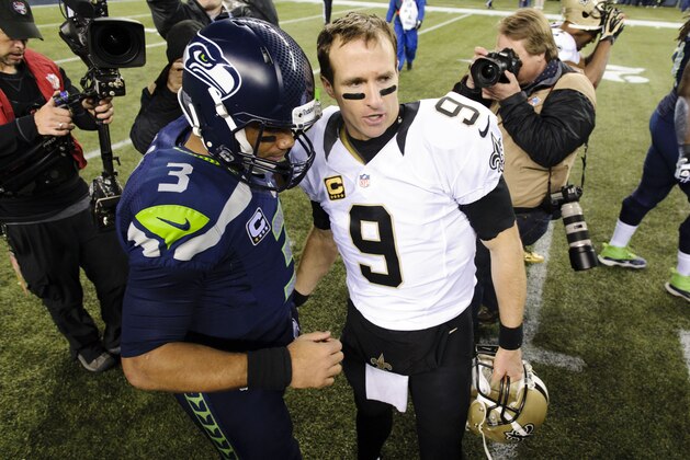 Dec 2, 2013; Seattle, WA, USA; Seattle Seahawks quarterback Russell Wilson (3) and New Orleans Saints quarterback Drew Brees (9) shake hands after the game at CenturyLink Field. Seattle defeated New Orleans 34-7. Mandatory Credit: Steven Bisig-USA TODAY Sports Dec 2, 2013; Seattle, WA, USA; Seattle Seahawks quarterback Russell Wilson (3) and New Orleans Saints quarterback Drew Brees (9) shake hands after the game at CenturyLink Field. Seattle defeated New Orleans 34-7. Mandatory Credit: Steven Bisig-USA TODAY Sports