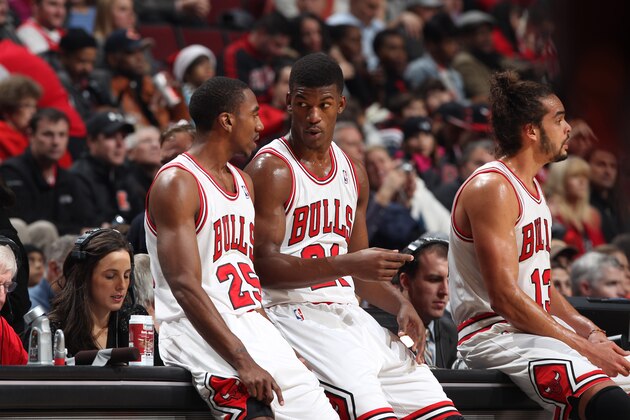 CHICAGO, IL - DECEMBER 16: Jimmy Butler #21 of the Chicago Bulls talks with teammate Marquis Teague #25 as Joakim Noah #13 waits to enter the game against the Orlando Magic on December 16, 2013 at the United Center in Chicago, Illinois. NOTE TO USER: User expressly acknowledges and agrees that, by downloading and/or using this photograph, user is consenting to the terms and conditions of the Getty Images License Agreement.  Mandatory Copyright Notice: Copyright 2013 NBAE (Photo by Gary Dineen/NBAE via Getty Images)