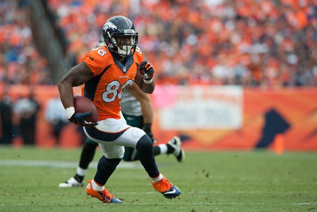 DENVER, CO - SEPTEMBER 29:  Wide receiver Demaryius Thomas #88 of the Denver Broncos runs for yards after the catch in the third quarter of a game at Sports Authority Field Field at Mile High on September 29, 2013 in Denver, Colorado.  (Photo by Dustin Bradford/Getty Images)