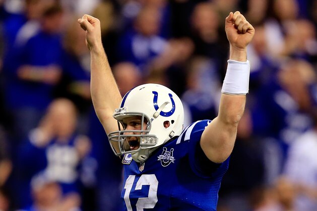 INDIANAPOLIS, IN - JANUARY 04:  Quarterback Andrew Luck #12 of the Indianapolis Colts celebrates after defeating the Kansas City Chiefs 45-44 in a Wild Card Playoff game at Lucas Oil Stadium on January 4, 2014 in Indianapolis, Indiana.  (Photo by Rob Carr/Getty Images)