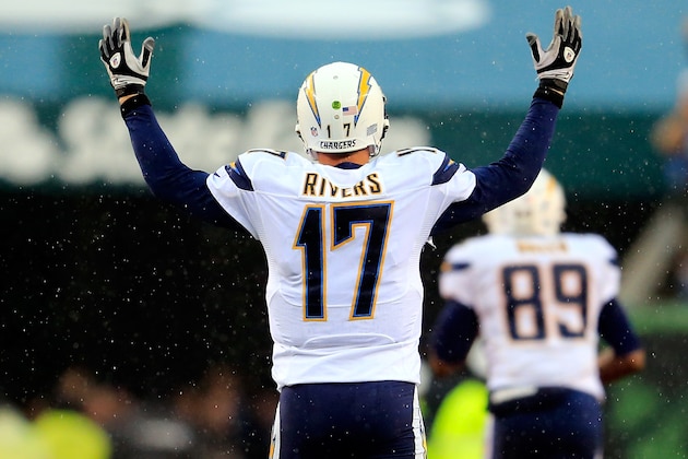 CINCINNATI, OH - JANUARY 05:  Quarterback Philip Rivers #17 of the San Diego Chargers celebrates against the Cincinnati Bengals in a Wild Card Playoff game at Paul Brown Stadium on January 5, 2014 in Cincinnati, Ohio.The San Diego Chargers defeated the Cincinnati Bengals 27-10.  (Photo by Rob Carr/Getty Images)