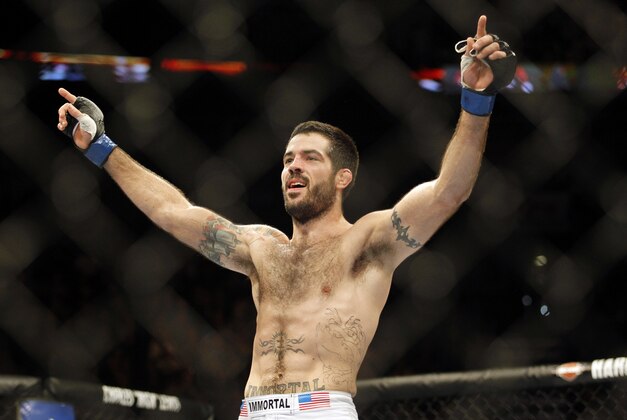 Dec 8, 2012, Seattle, WA, USA; Matt Brown celebrates his win over Mike Swick (not pictured) during the second round welterweight bout at MMA on FOX 5 at Key Arena. Mandatory Credit: Joe Nicholson-USA TODAY Sports