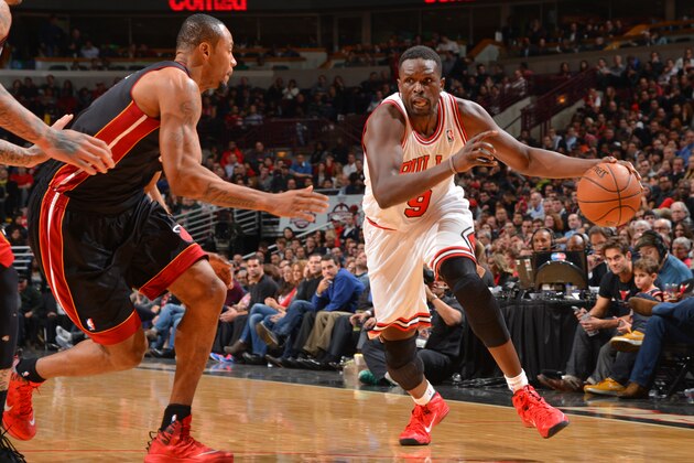 CHICAGO, IL - DECEMBER 5: Luol Deng #9 of the Chicago Bulls drives to the basket against the Miami Heat on December 5, 2013 at United Center in Chicago, Illinois. NOTE TO USER: User expressly acknowledges and agrees that, by downloading and or using this photograph, User is consenting to the terms and conditions of the Getty Images License Agreement. Mandatory Copyright Notice: Copyright 2013 NBAE (Photo by Jesse D. Garrabrant/NBAE via Getty Images) CHICAGO, IL - DECEMBER 5: Luol Deng #9 of the Chicago Bulls drives to the basket against the Miami Heat on December 5, 2013 at United Center in Chicago, Illinois. NOTE TO USER: User expressly acknowledges and agrees that, by downloading and or using this photograph, User is consenting to the terms and conditions of the Getty Images License Agreement. Mandatory Copyright Notice: Copyright 2013 NBAE (Photo by Jesse D. Garrabrant/NBAE via Getty Images)