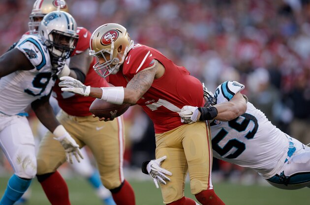 SAN FRANCISCO, CA - NOVEMBER 10:  Colin Kaepernick #7 of the San Francisco 49ers is sacked by Luke Kuechly #59 of the Carolina Panthers at Candlestick Park on November 10, 2013 in San Francisco, California.  (Photo by Ezra Shaw/Getty Images)