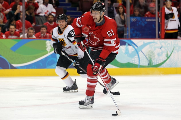 VANCOUVER, BC - FEBRUARY 23:  Rick Nash #61 of Canada handles the puck during the ice hockey Men's Qualification Playoff game between Germany and Canada on day 12 of the Vancouver 2010 Winter Olympics at UBC Thunderbird Arena on February 23, 2010 in Vancouver, Canada.  (Photo by Jamie Squire/Getty Images)