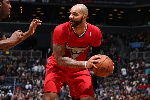 BROOKLYN, NY - DECEMBER 25:  Carlos Boozer #5 of the Chicago Bulls handles the ball during a game against the Brooklyn Nets on December 25, 2013 at Barclays Center in Brooklyn, New York. NOTE TO USER: User expressly acknowledges and agrees that, by downloading and or using this Photograph, user is consenting to the terms and conditions of the Getty Images License Agreement. Mandatory Copyright Notice: Copyright 2013 NBAE (Photo by David Sherman/NBAE via Getty Images)