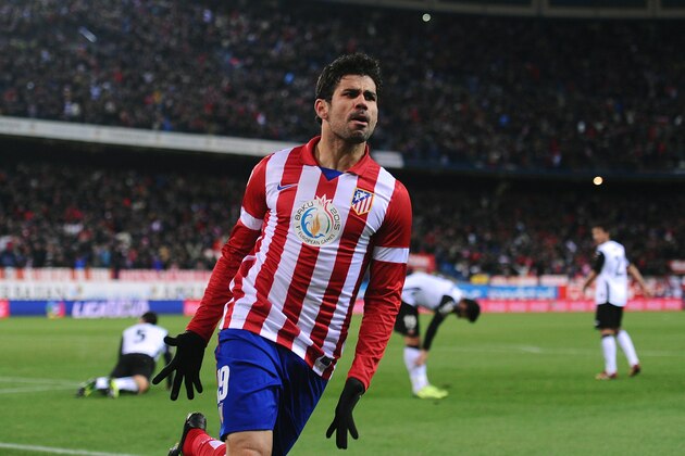 MADRID, SPAIN - DECEMBER 15:   Diego Costa of Club Atletico de Madrid celebrates after scoring Atletico's opening goal during the La Liga match between Club Atletico de Madrid and Valencia CF at Vicente Calderon Stadium on December 15, 2013 in Madrid, Spain.  (Photo by Denis Doyle/Getty Images)