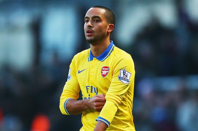 LONDON, ENGLAND - DECEMBER 26:  Theo Walcott of Arsenal looks on during the Barclays Premier League match between West Ham United and Arsenal at Boleyn Ground on December 26, 2013 in London, England.  (Photo by Bryn Lennon/Getty Images)
